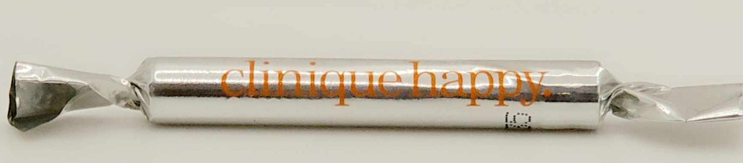 Clinique Happy fragrance sample wrapped in silver foil with orange logo, promotional mini perfume Ghbb Trading